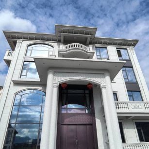 赣州白麻别墅外墙干挂石材效果示例