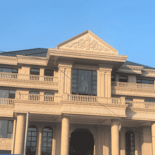 赣州黄金麻别墅外墙干挂石材效果示例