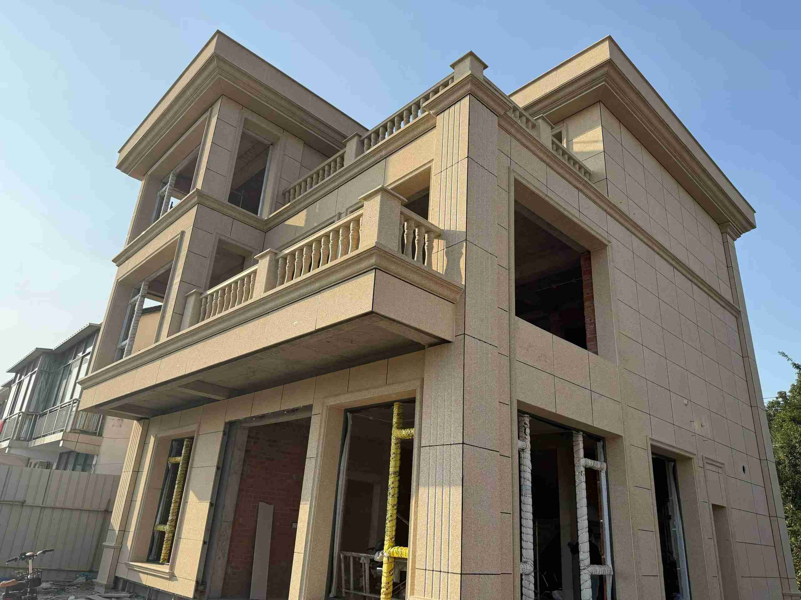 赣州 黄金麻花岗岩石材荔枝面外墙干挂效果展示